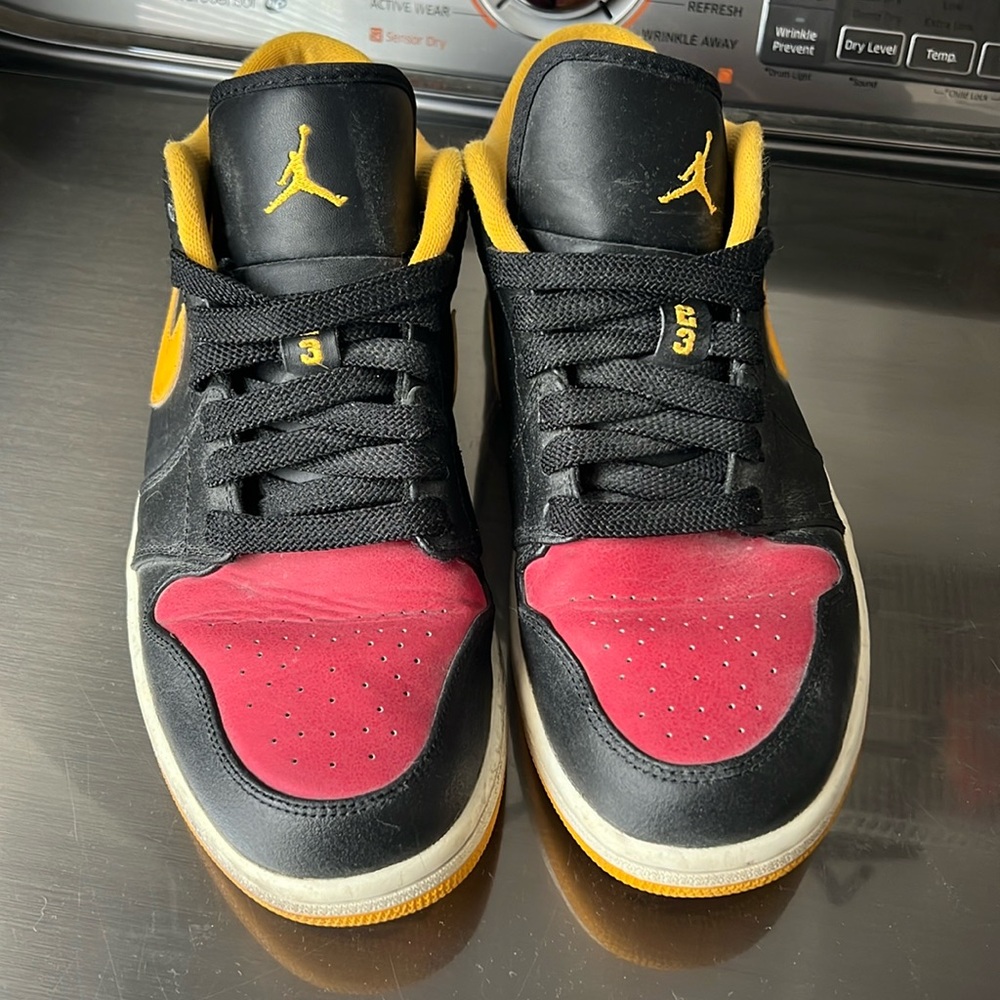 Black red and gold air Jordan’s
